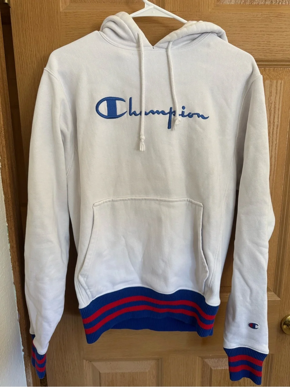 Champion White Hoodie with Blue Script and Red-Blue Ribbing